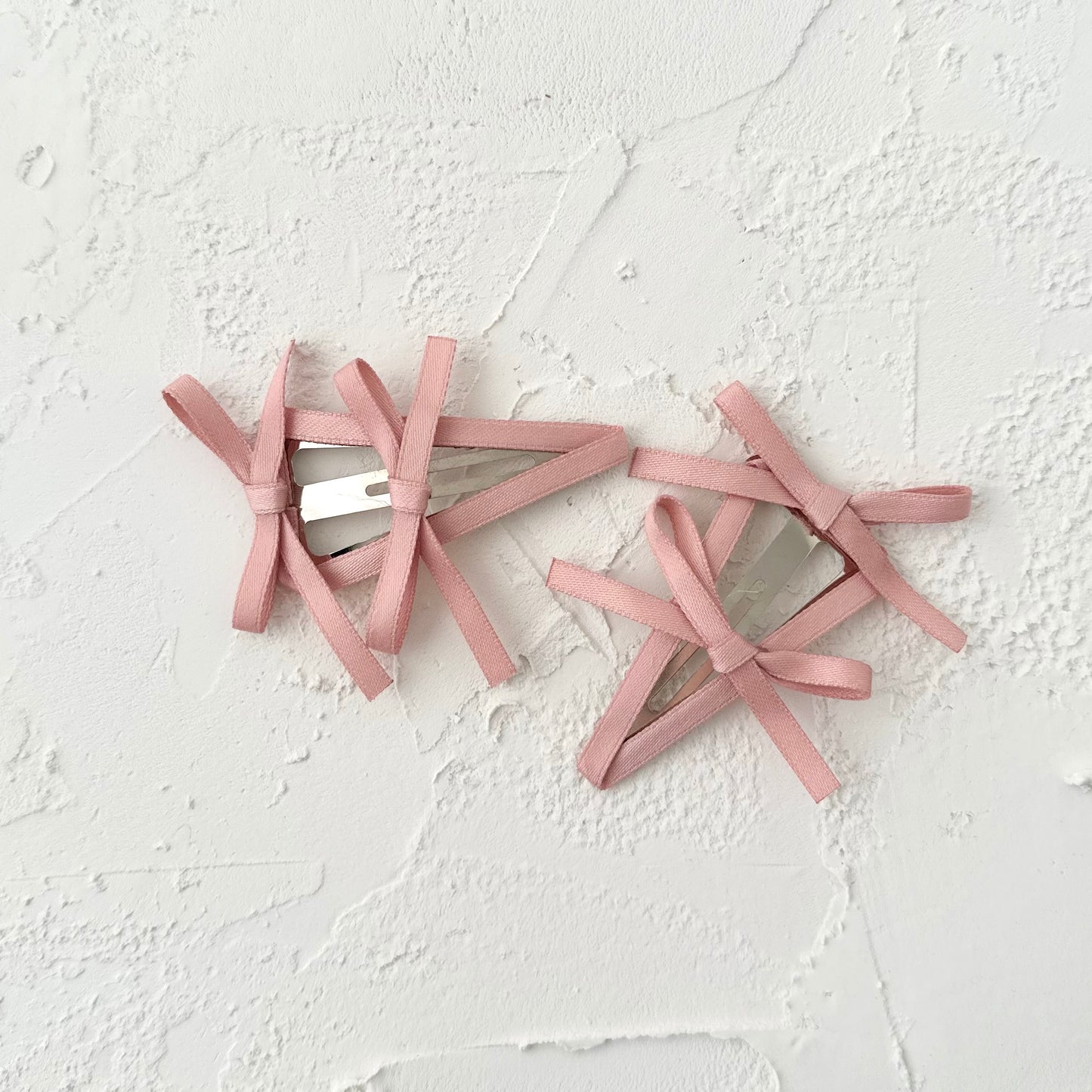 Pinces à cheveux doubles nœuds